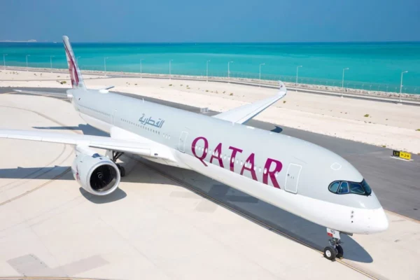 Qatar Airways Boeing 777X widebody jet at Boeing production facility, part of record-breaking aircraft order.