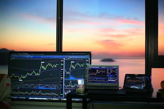 Cryptocurrency and stock market charts showing upward trends amid market rebound
